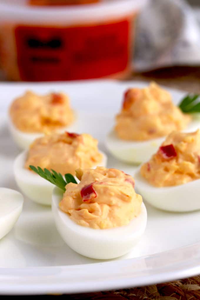 Pimento cheese deviled eggs with garnish