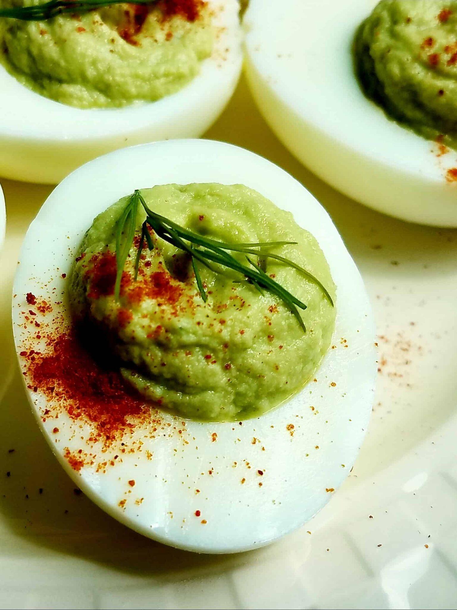 Healthy angeled eggs with a green filling