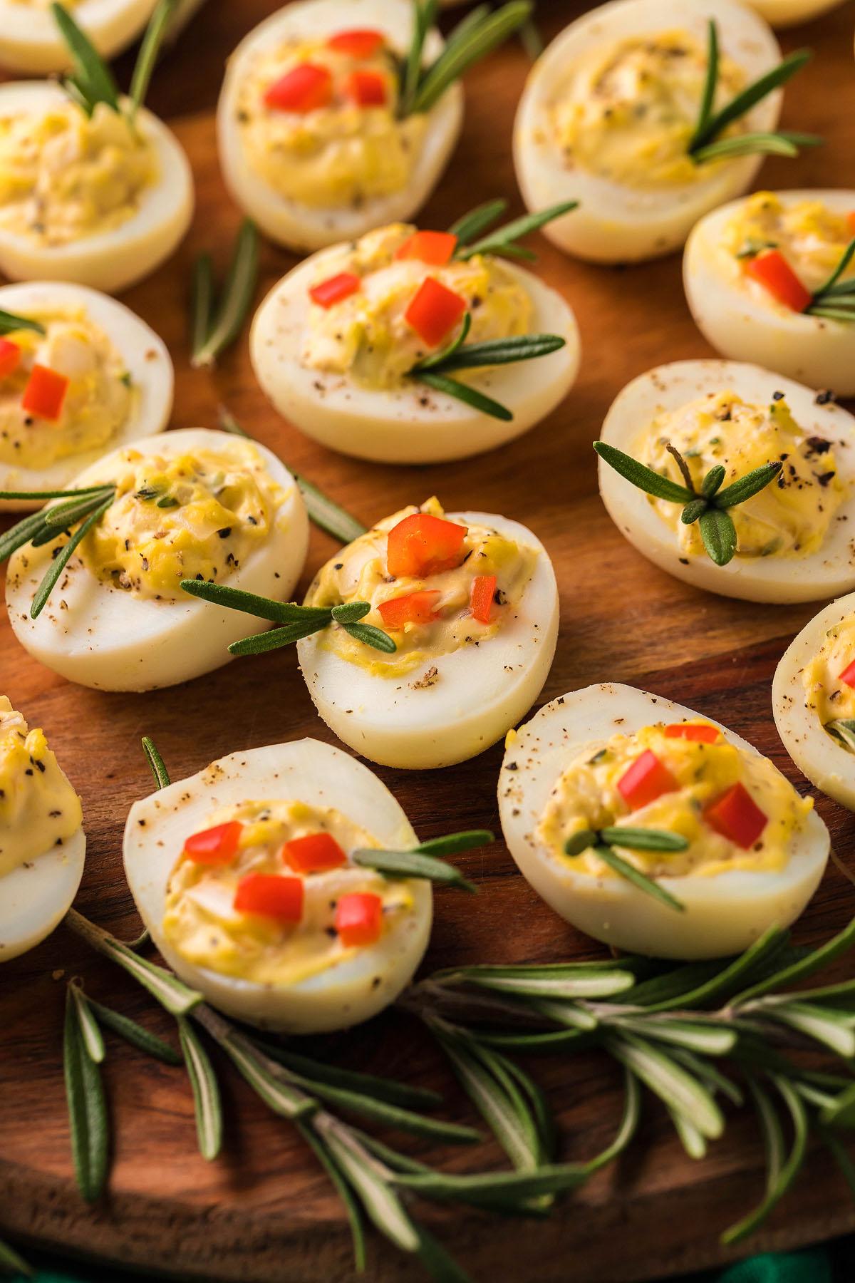 Christmas deviled eggs with greenery as a garnish