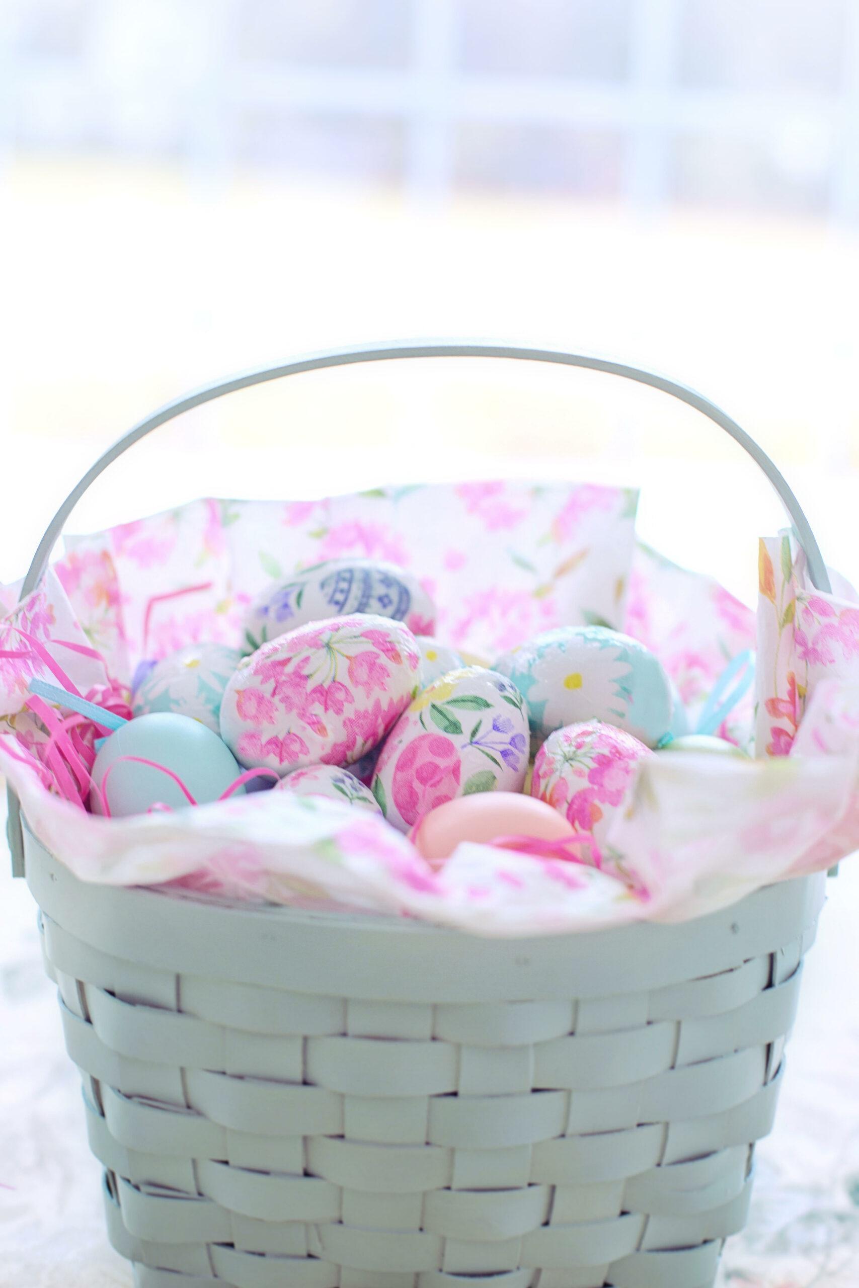 Hand-painted Easter eggs in a light blue Easter basket