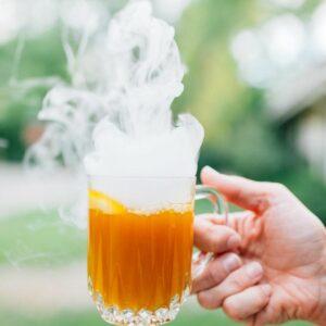 Spooky Halloween Mocktails in a hand