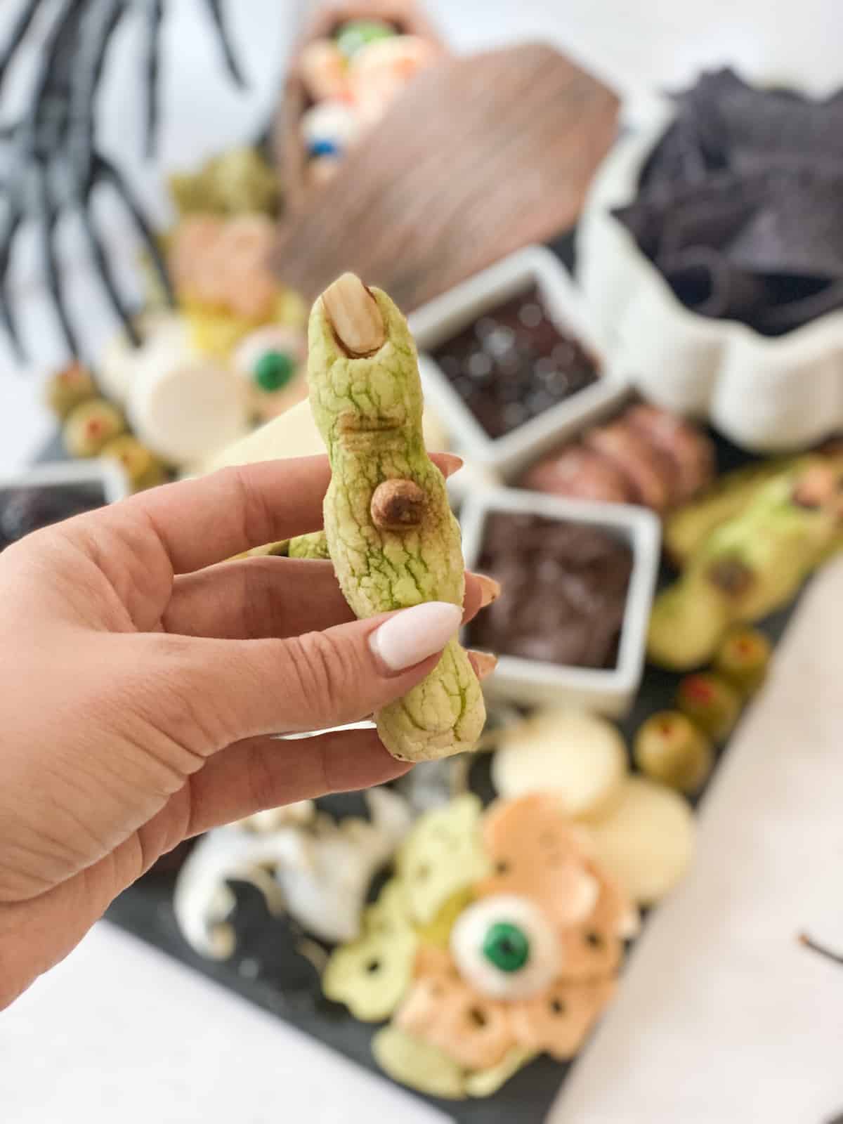 Halloween Charcuterie Board witches finger cookie