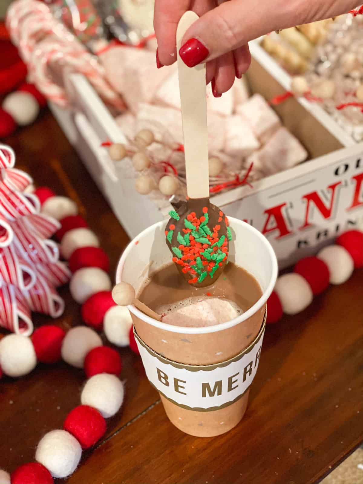 Dipping chocolate into hot cocoa