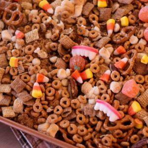 Halloween Chex Mix on a baking sheet