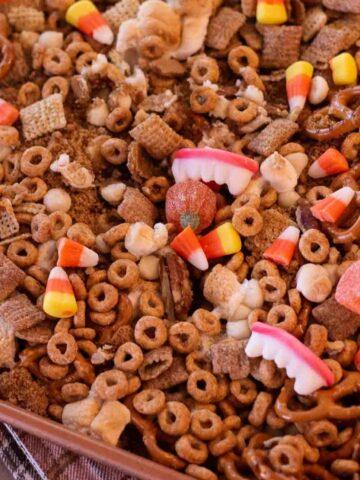 Halloween Chex Mix on a baking sheet