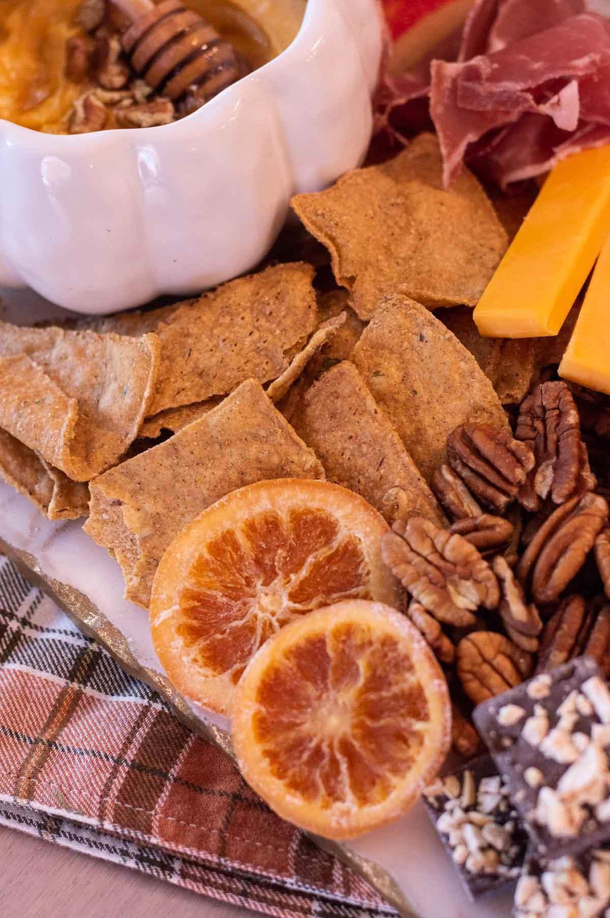 Fall Charcuterie Board with candied oranges and nuts