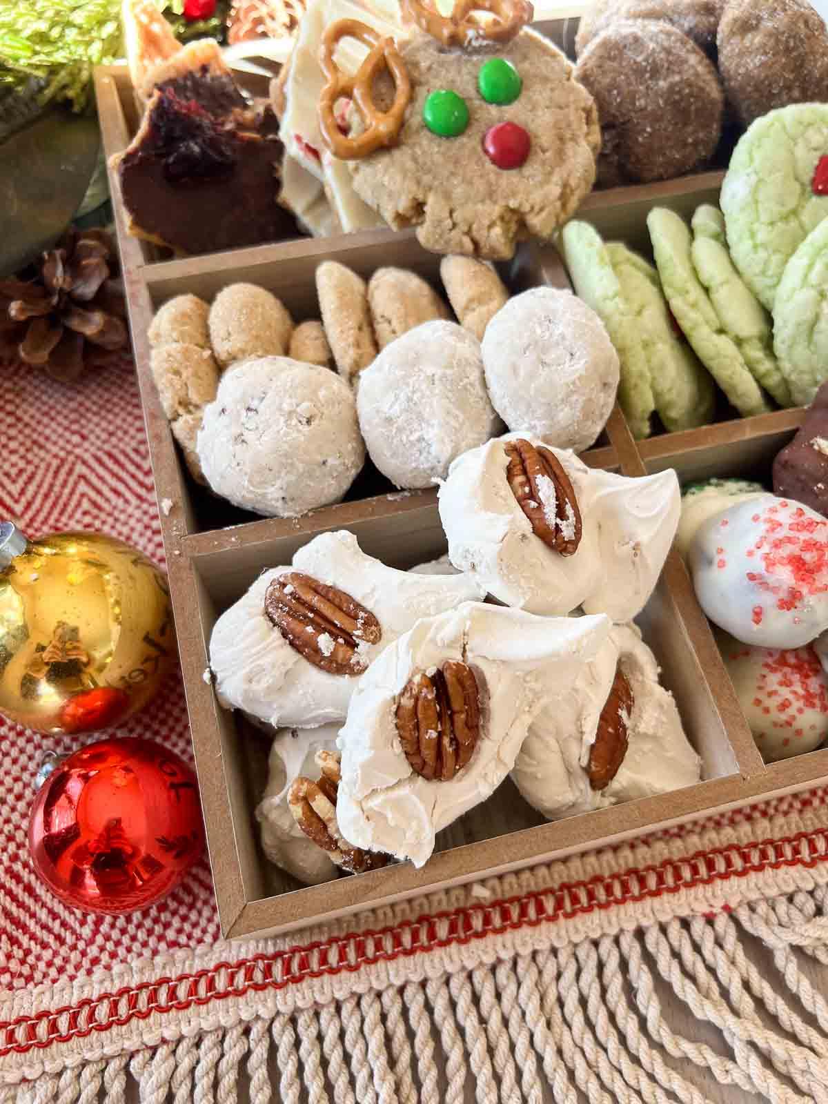 Holiday Cookie Boxes with gingerbread men, cookies and candy