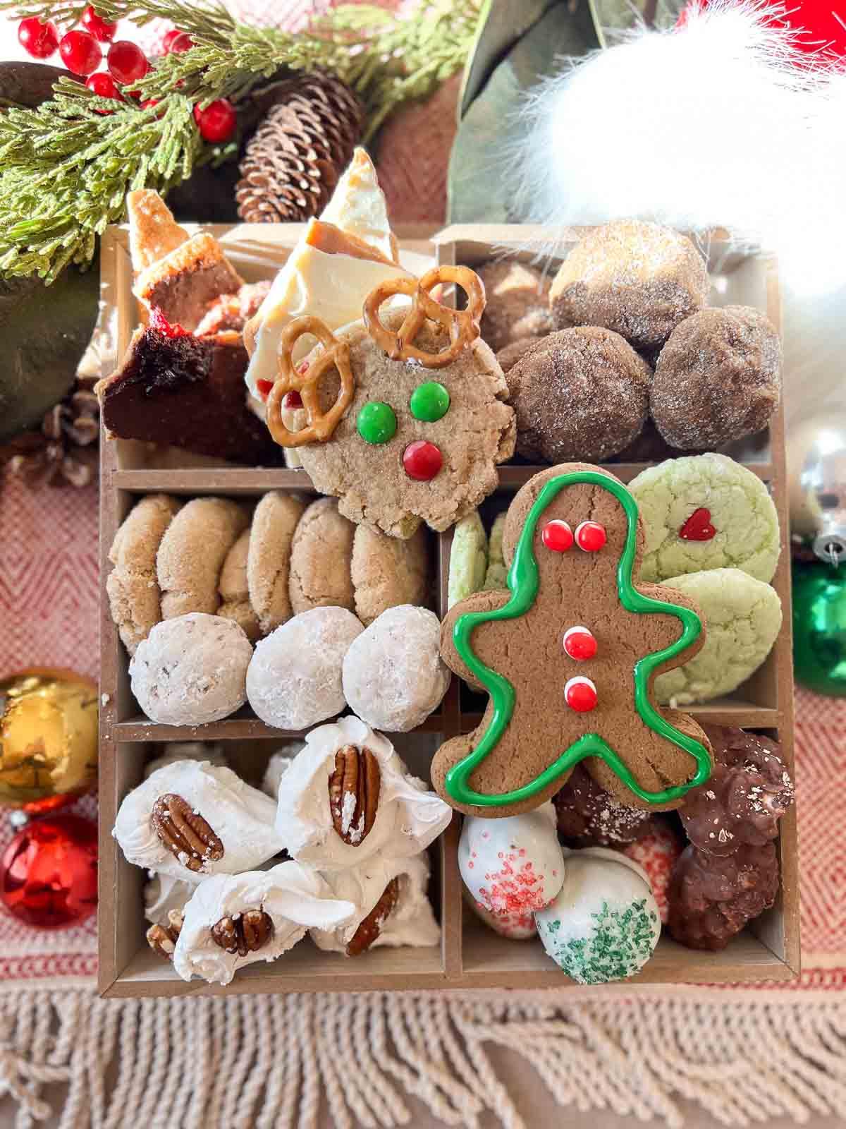 Holiday Cookie Boxes with gingerbread men, cookies and candy