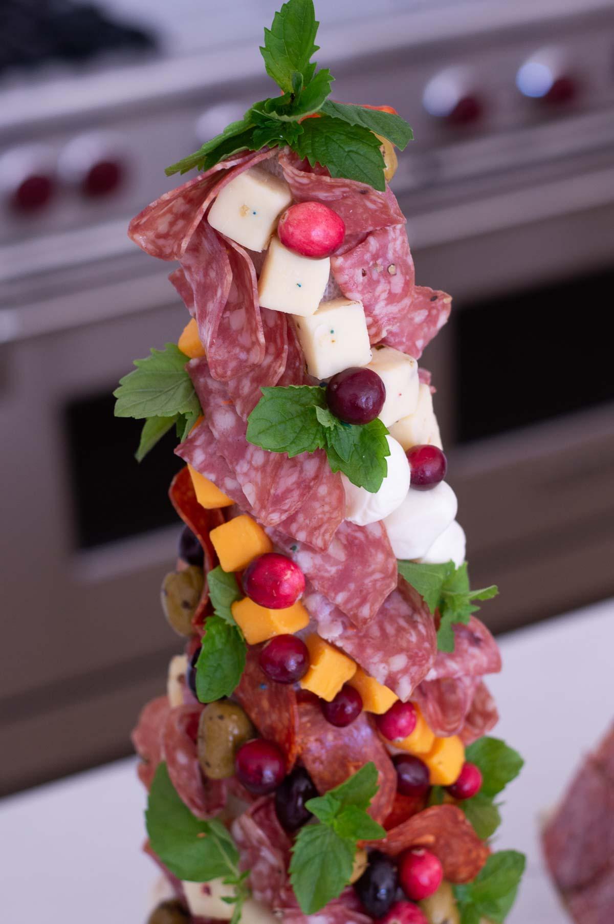 How to make a charcuterie tree cheese, salami, mint and cranberries on a styrofoam tree