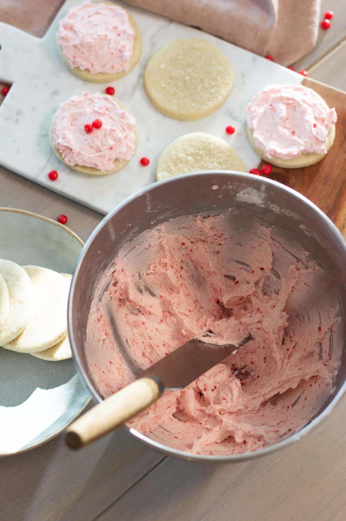 Red hot cookie recipe frosting in a large bowl