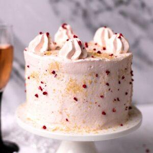 Pink Champagne Cake on a cake stand