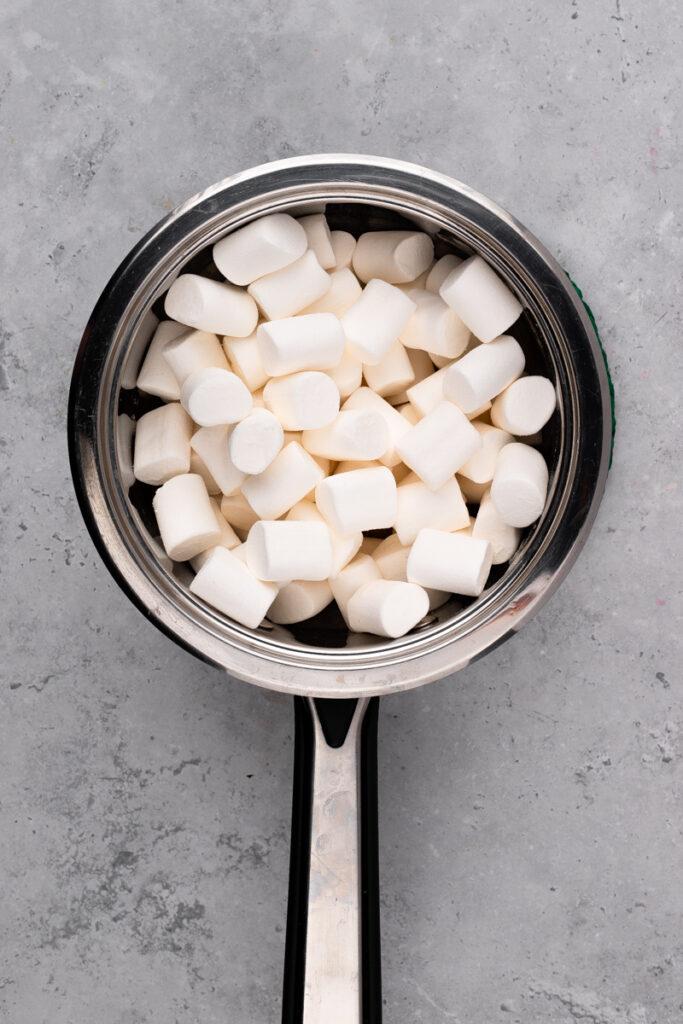 stainless steal pan with marshmallows inside